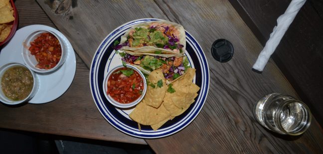 Chicken tacos served with chips and salsa
